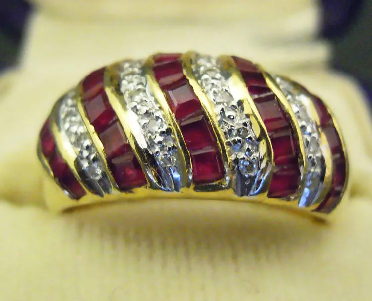 18ct gold diamond and ruby bombe ring, UK size L