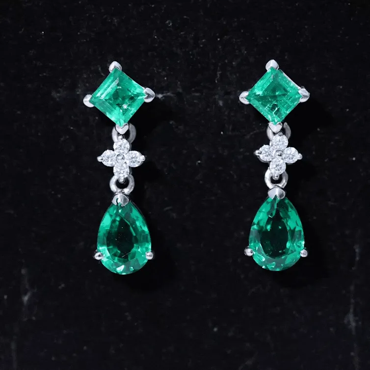 3.5 CT Created Emerald and Moissanite Bridal Dangle Earrings in Gold