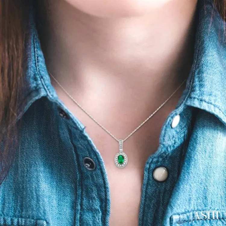 6x4mm Oval Cut Emerald and 1/8 Ctw Round Cut Diamond Pendant in 14K White Gold with Chain