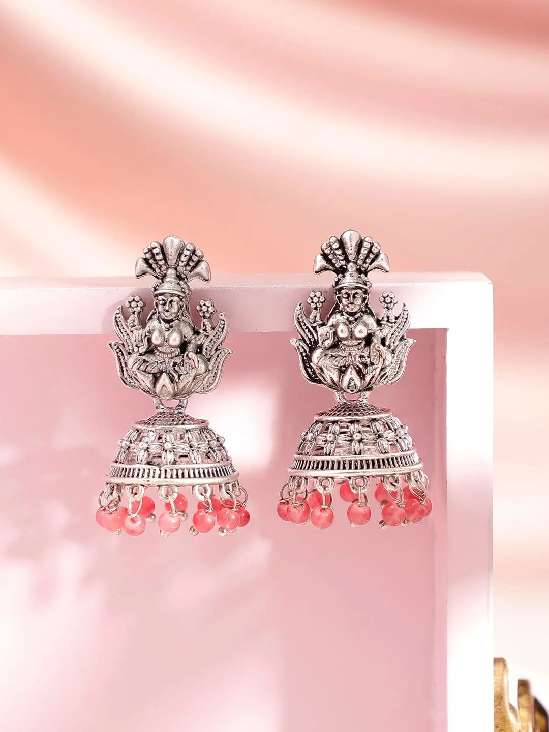 Rubans Oxidised Silver-Plated Coral Pink Beaded Goddess Laxmi Design Dome Shaped Jhumkas