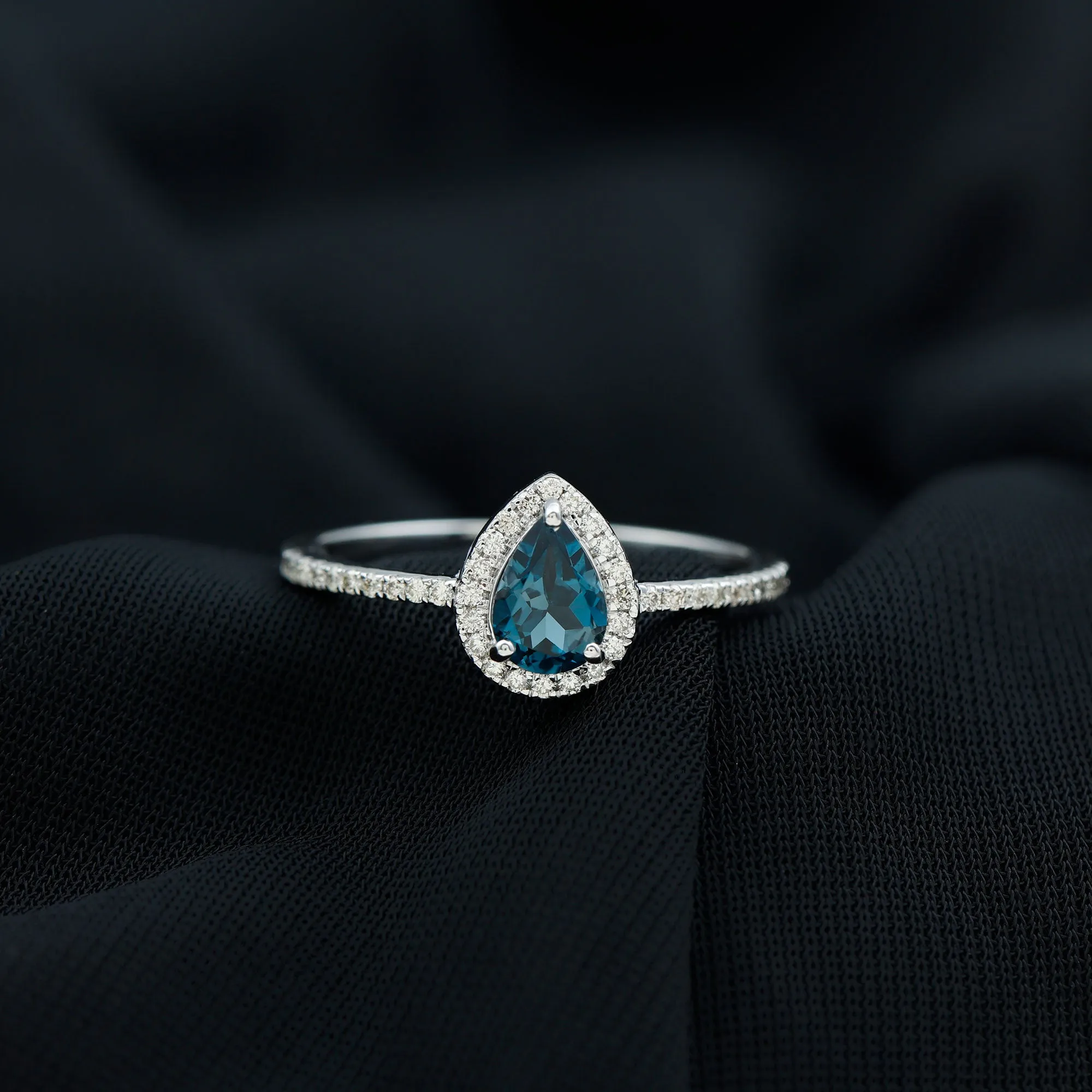 Simple London Blue Topaz Teardrop Ring with Moissanite Halo