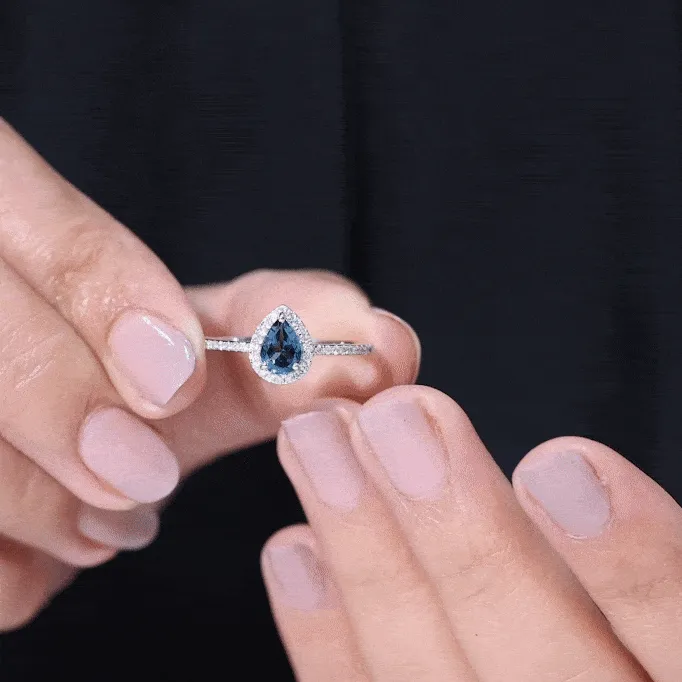 Simple London Blue Topaz Teardrop Ring with Moissanite Halo